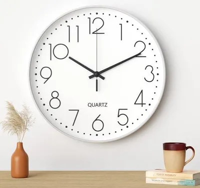 Zdjęcie produktu dla Czarny zegar ścienny z tworzywa sztucznego, o średnicy 30 cm, elegancki model w kolorze czarno-białym