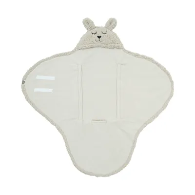 A baby swaddle blanket with a bunny hood, laid flat on a white background.