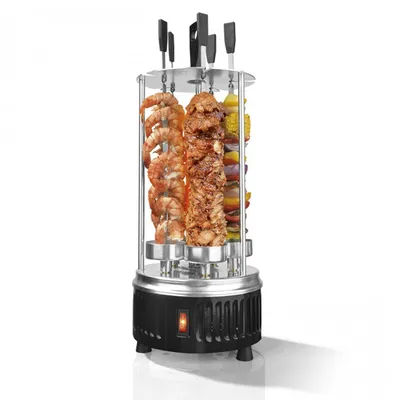 A vertical rotisserie grill with food on skewers, set against a white background.