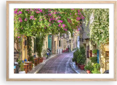 Produktbild von Gerahmtes Poster - Rahmen in heller Eiche - Straße dekoration blumen griechenland - 70x50 cm - Wand Bild - Wanddeko - Wandbilder - Wandposter - Bilderrahmen - Bilder - Kunstdruck - P2NAA70x50-2429