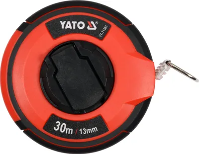 A close-up, studio shot of a Yato brand tape measure.