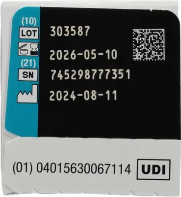A close-up of product packaging with text and a QR code.