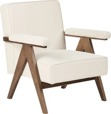 A studio shot of a retro-style armchair with a beige fabric upholstery and wooden legs.
