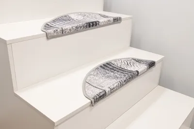 Obrázok produktu pre Protisklzová rohož na schody ESSENZA 19 v svetlosivej farbe, rozmery 64 x 23 cm, sada 15 kusov