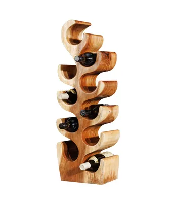 A wooden wine rack with several bottles of wine.