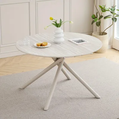 Image de Table ronde - table de cuisine moderne avec un plateau imitation travertin gris et des pieds en métal