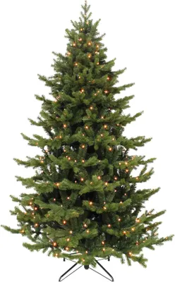 A full shot of a green artificial Christmas tree with lights, standing on a white background.