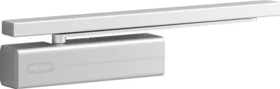 A silver door closer mechanism with an attached arm, shown in a studio setting against a white background.