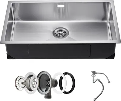 A stainless steel kitchen sink and its accessories are displayed against a white background.