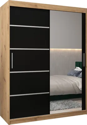 A wardrobe with sliding doors and a mirror, reflecting a bedroom scene.