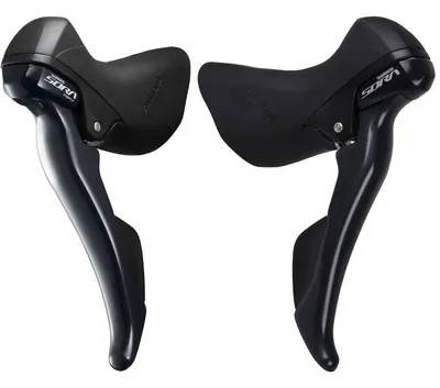 A pair of black and gray bicycle gear and brake levers are shown against a white background.