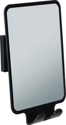 A black wall-mounted mirror with a shelf for holding items.
