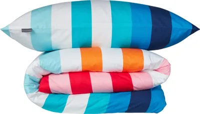 A stack of bedding with stripes in various colors.