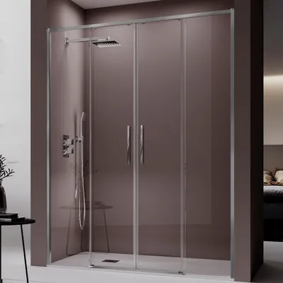 A modern shower enclosure with two sliding doors, featuring a sleek chrome finish and glass panels.