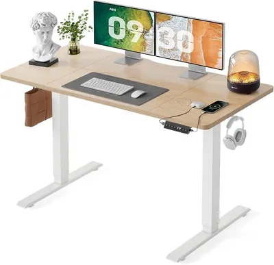 Imagen del producto de Escritorio de altura ajustable de 140x70 cm con puertos de carga USB-C y USB-A