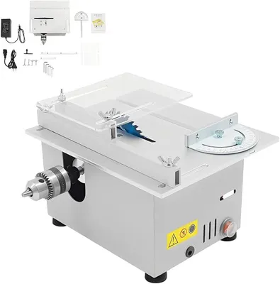 Immagine prodotto di Mini sega circolare da banco, 96W, 7 velocità, profondità di taglio regolabile da 0 a 29 mm, inclinazione regolabile a 180°, diametro del disco da 110 mm, 4000-9000 giri/min, ideale per progetti fai-da-te e modellismo