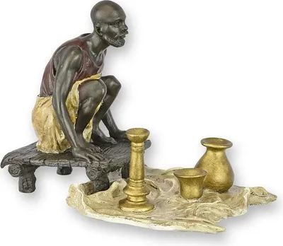 Productafbeelding van A Bronze Sculpture Of An Arab Pottery Vendor