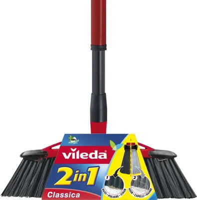 A Vileda 2-in-1 Classica broom is shown against a white background. The broom has black bristles and a red and gray handle. Packaging with product information is visible in the foreground.