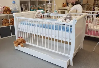 Produktbild von Babybett im Schlittenstil in Weiß