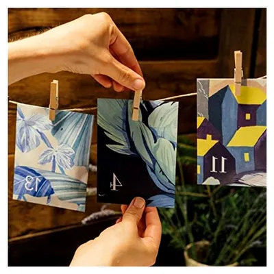 Produktbild von Bio-Saatgut-Adventskalender - Kräuterwelt mit 24 Adventskalendertütchen aus Papier und Bio-Kräutersamen