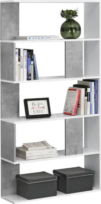 A white and concrete-look bookshelf filled with books and decorative items.
