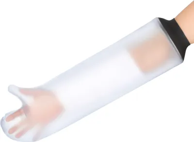 A person's arm wearing a clear waterproof cast cover.