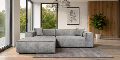 Productafbeelding van Designbank CARLOTA, model "Perfect Harmony", in grijze stof. Hoekbank met ottoman aan de linkerkant