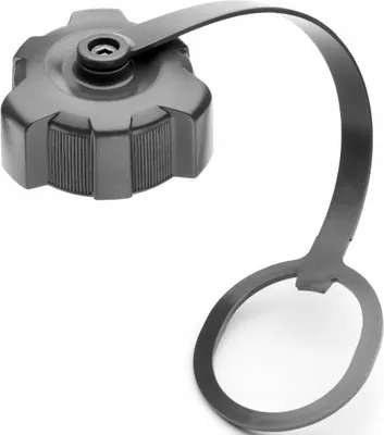 A close-up studio shot of a dark gray plastic cap with a tether strap, isolated on a white background.