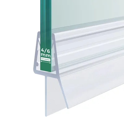 A close-up of a shower door seal with a measurement indicator.