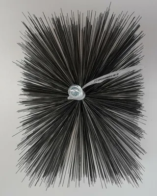 A brush with metal bristles, attached by a screw in the center.