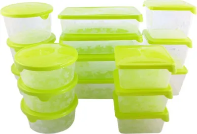 A collection of clear plastic food storage containers with bright green lids, stacked and arranged against a white background.