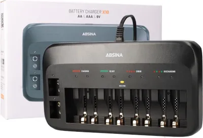 A black ABSINA X10 battery charger is shown in front of its packaging.
