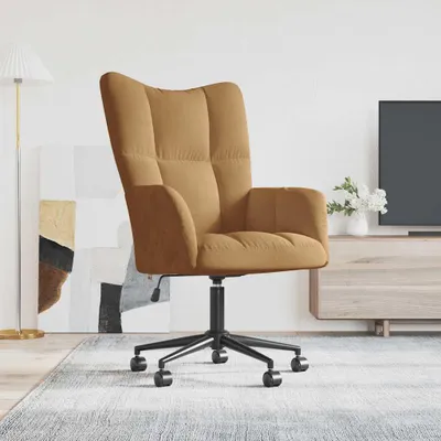 A brown velvet office chair is shown in a room with a floor lamp, abstract art, and a TV stand.