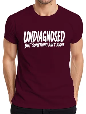 Immagine prodotto di T-shirt "Undiagnosed But Something Ain't Right Lustig Statement", colore bordeaux, taglia XXL