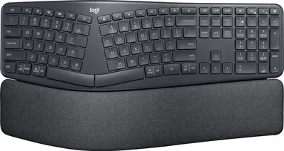 A split ergonomic keyboard with a wrist rest.