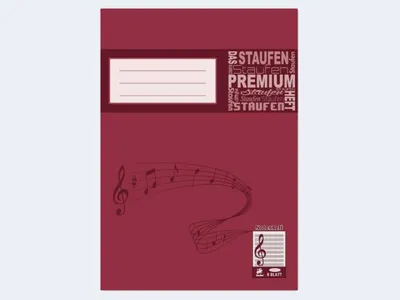 A maroon notebook with musical notes and text on the cover.