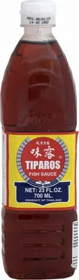 A bottle of Tiparos Fish Sauce against a white background.