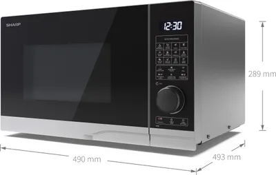 A studio shot of a SHARP microwave oven with dimensions indicated.