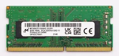 A close-up, top-down view of a computer memory module (RAM stick) against a white background.