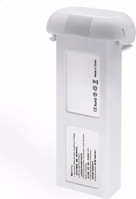 A white drone battery is shown against a white background.