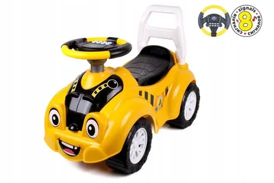 A yellow toy car with a smiling face, large eyes, and black and yellow details.