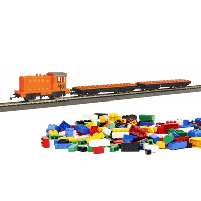 Produktbild von PIKO Start-Set mit Bettung Güterzug mit Klemmbaustein-Wagen R/C 57143