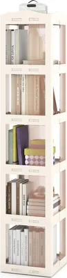 A tall, narrow, rotating bookshelf filled with books and decorative boxes.