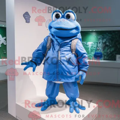 Obrázek produktu pro Postava REDBROKOLY maskota modré žáby oblečená ve větrovce a kabelkách