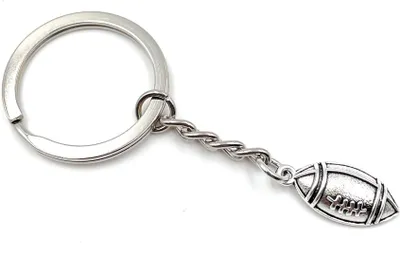 Zdjęcie produktu dla Onwomania Football Ballsport Team brelok metalowy talizman w aluminiowym pudełku, idealny na prezent