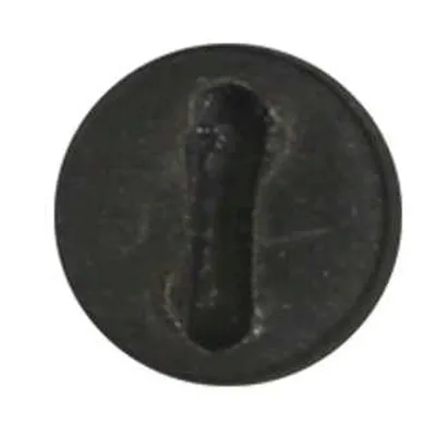 A close-up of a black carbon brush cover.
