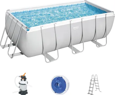 A rectangular above-ground swimming pool with its accessories.