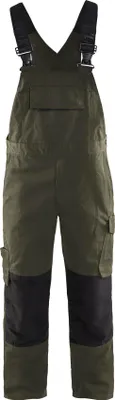 A pair of olive green and black overalls shown against a white background.