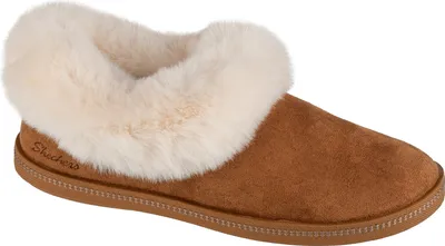 A single brown slipper with a cream-colored fuzzy lining is shown against a white background.