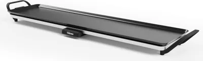A long, flat electric griddle with black cooking surface and silver trim, shown from a slight angle on a white background.